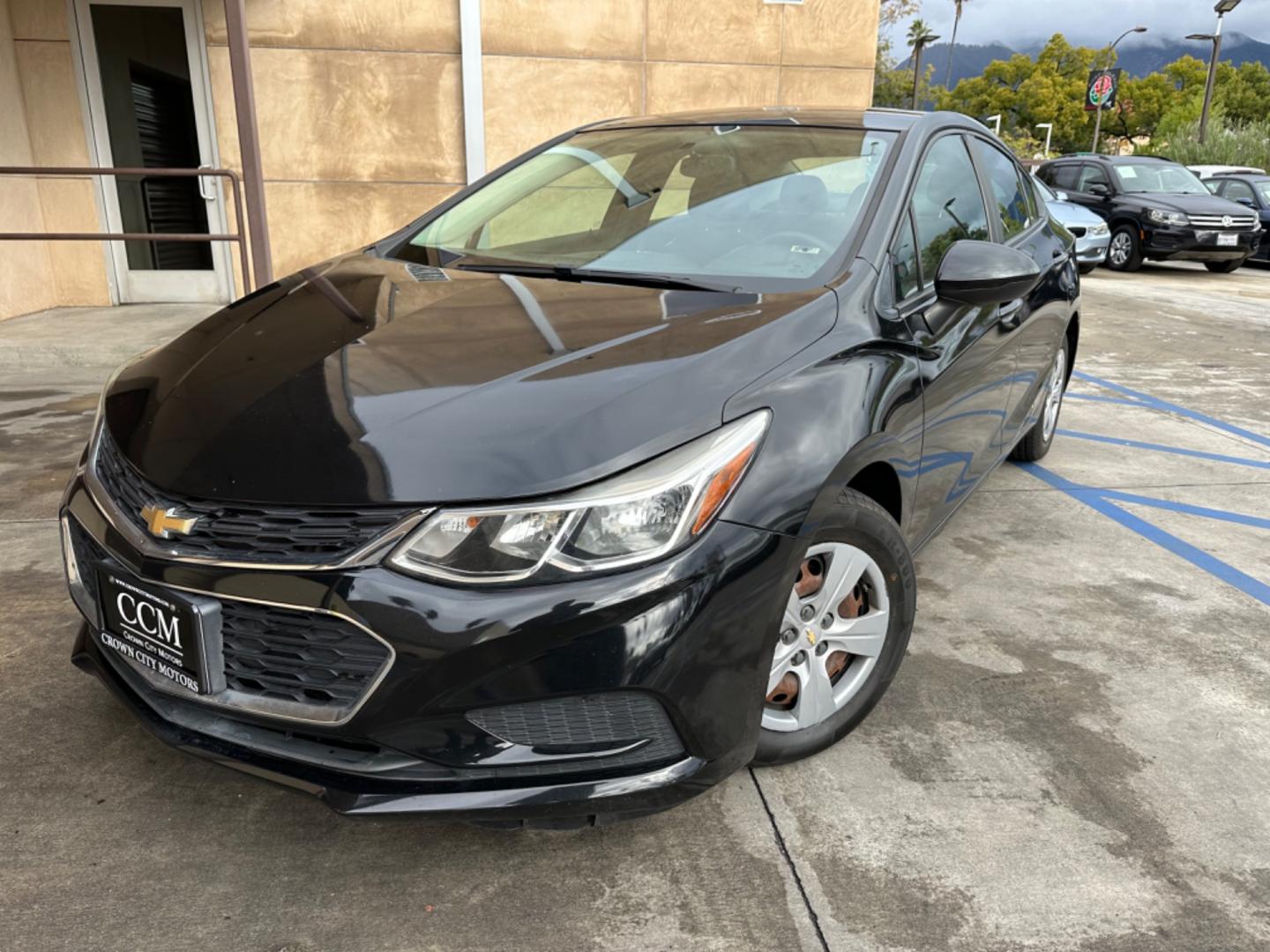 2017 Black /BLACK Chevrolet Cruze LS Auto (1G1BC5SM6H7) with an 1.4L L4 DOHC 16V TURBO engine, 6A transmission, located at 30 S. Berkeley Avenue, Pasadena, CA, 91107, (626) 248-7567, 34.145447, -118.109398 - Crown City Motors is a used “Buy Here Pay Here” car dealer in Pasadena CA. “Buy Here Pay Here” financing, means that when you purchase your vehicle from our dealership, that you make the payments to the dealership as well. We do not need the banks approval to get you approved for a used auto - Photo#0